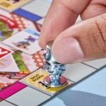 Monopoly GO! Board Game | Inspired by The Popular Mobile Board Game | Ages 8+ | 2-4 Players | 15 Mins. | Family Games | Travel Games for Kids and Adults (English & French) - Image 4